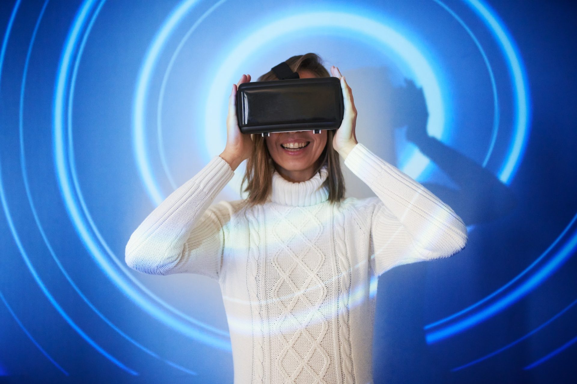 a-girl-in-virtual-reality-glasses-e1686030496577.jpg